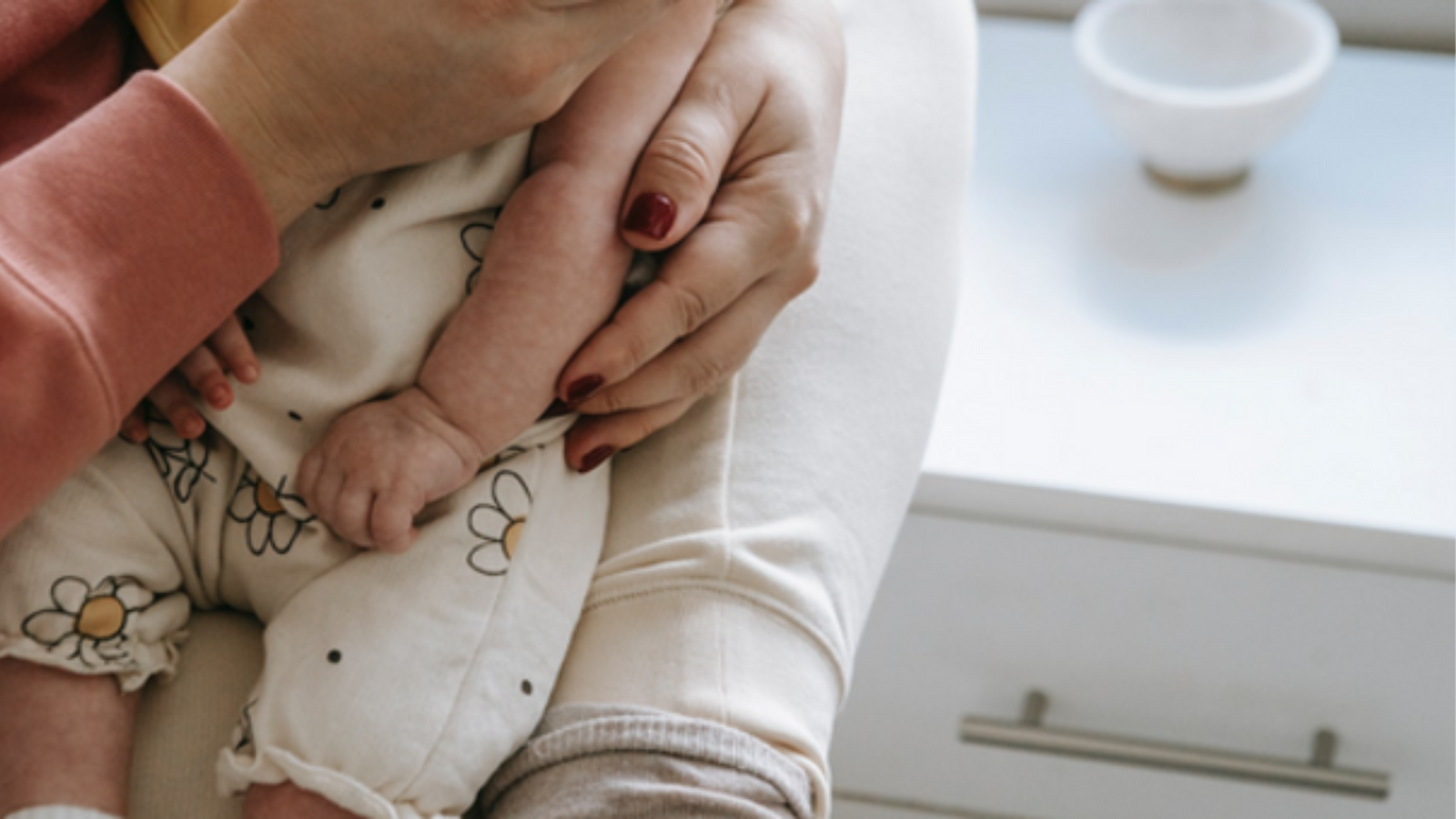 woman holding a newborn